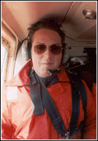 Darren Stewart in a helicopter, in his survival suit